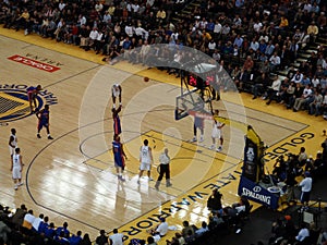 Pistons player shots free throw shoot with ball in the air