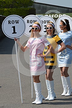 Pit girls line up at the start straight at the Benjafields Sprint.