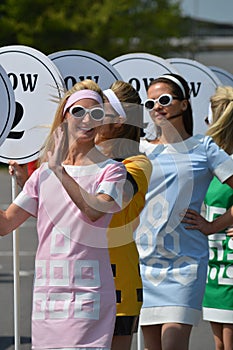 Pit girls line up at the start straight at the Benjafields Sprint.