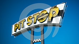 Pit stop sign and text