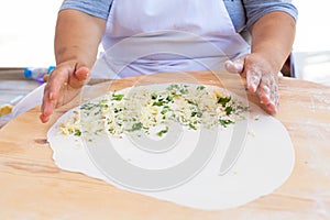 Pita bread with cottage cheese and greens