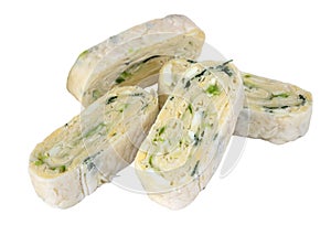 Pita bread lavash, roll with cheese, egg, dill and cucumber cut into pieces, isolated on white background.