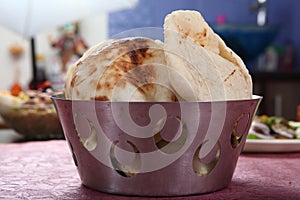 pita bread, leavened flatbread, arabic bread, lebanese bread photo