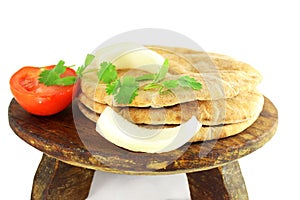 Pita flat bread or nan closeup in pure white background