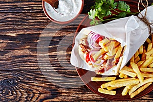 Pita ma gyro on a clay plate