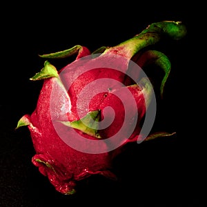 Pitahaya Pitahaya Dragonfruit on a black background close-up, square pic