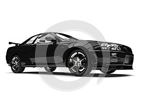 Pitch black urban sports car - low angle shot