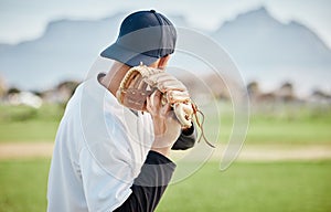 Pitcher, back view or baseball player training for a sports game on outdoor field stadium. Fitness, young softball