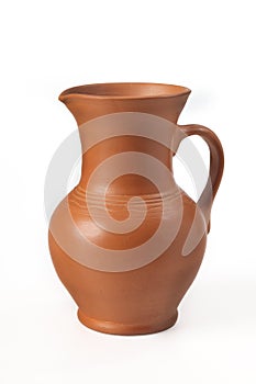 Pitcher ceramic handmade with handle. Isolated on white background.