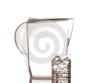 Pitcher and glass with droplets