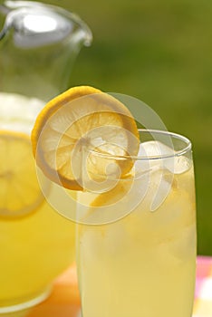 Pitcher and glass of lemonade