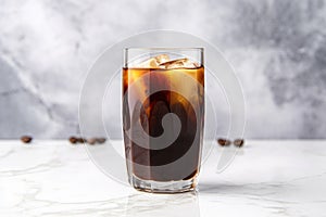 pitcher of homemade cold brew coffee on a marble surface