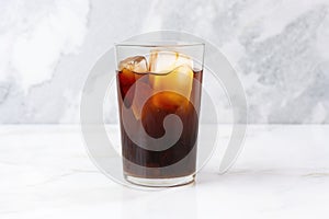 pitcher of homemade cold brew coffee on a marble surface