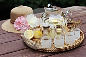 Pitcher of Lemonade and glasses on a table