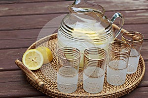 Pitcher of Lemonade and glasses on a table