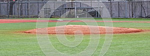 Pitchers mound on a turf baseball field