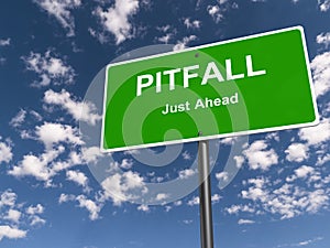 Pitfall just ahead traffic sign photo