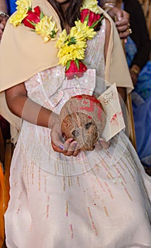 Pithi/Haldi Ceremony coconut in hands