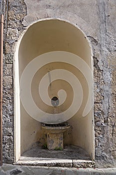 Pitigliano medieval town in Tuscany, Italy. Fountain