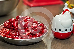 Pitted cherries are ready in pie bowl. Step by step recipe