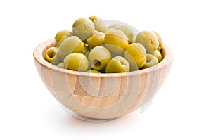 Pitted green olives in bowl