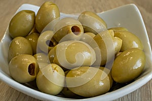 Pitted green olives closeup