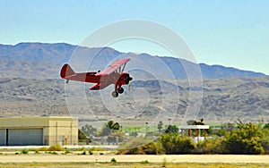 Pitts Biplane Landing After Completing Aerial Stunts photo