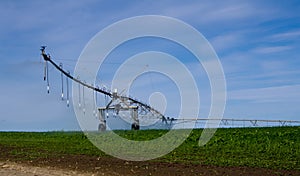 Pivot irrigation system operating with water