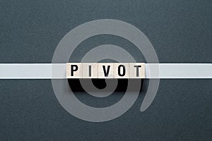 Pivot word concept on cubes photo