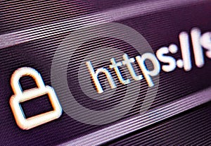 Pixelated closeup view of an internet browser search bar with https text and secure icon