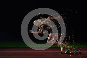 Pixelated design of woman sprinter leaving starting blocks photo