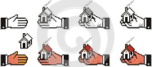 Pixelated Hands with Houses and Keys photo