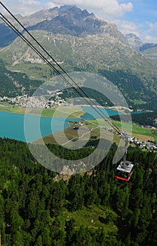 The Piz Corvatsch Cable Car above the Silvaplana glacier lake in