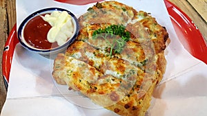 pizza bread serve with sauce good smell and yummy