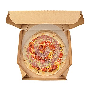 Pizza in brown corrugated fiberboard take-out box isolated photo