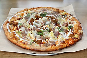 Pizza. Buffalo Chicken Pizza with Chicken Sausage and Pineapple
