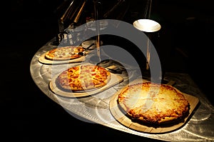 Pizza Buffet on Stainless Steel Counter