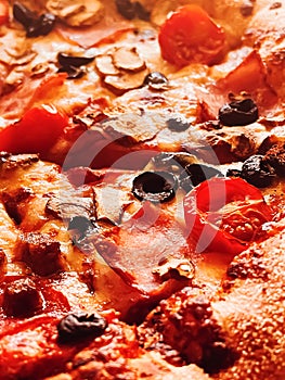 Pizza capriciosa in pizzeria, food background