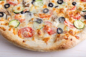 Pizza with cheese and vegetables