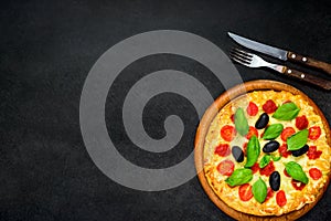 Pizza with Cheese and Vegetables on Dark Background
