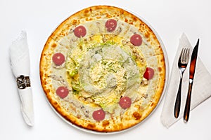 Pizza with chicken, cheese, herbs and tomatoes