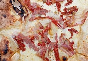 Pizza Close up Dried tomatoes mozzarella pancetta