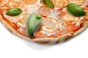 Pizza Close Up with tomatoes, cheese and basil isolated on white background. Copyspace. Top view