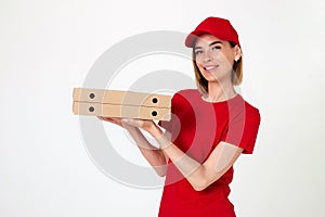 pizza delivery woman in uniform holding pizza boxes