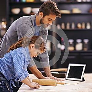 Pizza, dough and child with father in kitchen and tablet with recipe, guide and learning from online tutorial. Cooking