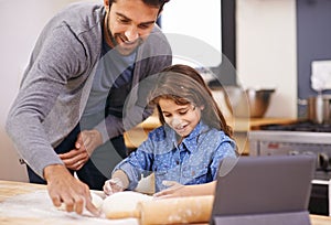 Pizza, dough and father with child in kitchen and tablet with recipe, guide and learning from online tutorial. Cooking