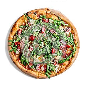 Pizza with dry cured ham and arugula