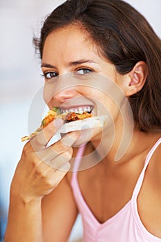 Pizza, eating and portrait of young woman for dinner, lunch or supper with positive attitude. Happy, smile and female