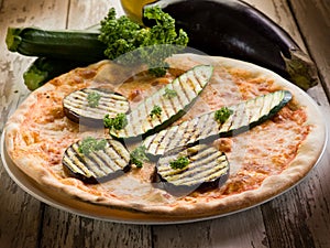 Pizza with grilled zucchinis photo