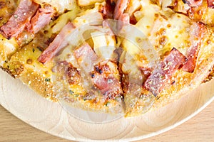 Pizza ham cheese on wood tray